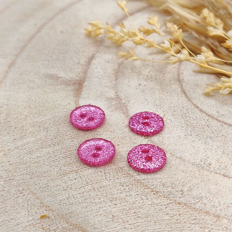 Boutons en plastique pailletés - 10 mm rose